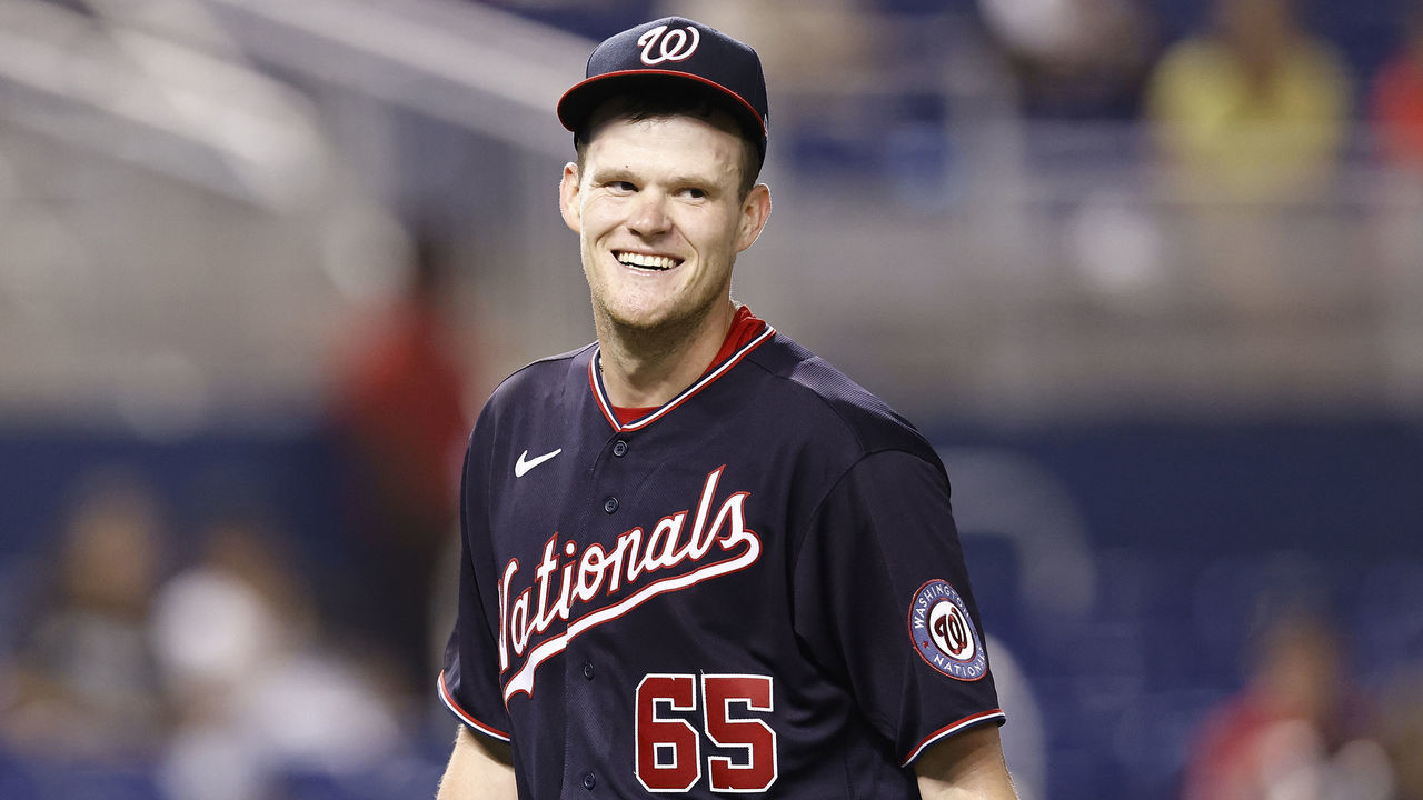 MIAMI, FLORIDA - SEPTEMBER 21: Josh Rogers #65 of the Washington Nationals reacts after being taken out of the game against the Miami Marlins during the eighth inning at loanDepot park on September 21, 2021 in Miami, Florida.