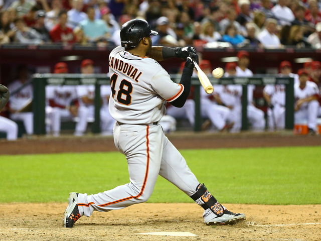 VIDEO: Giants' Sandoval takes hilariously late swing to force an errant throw