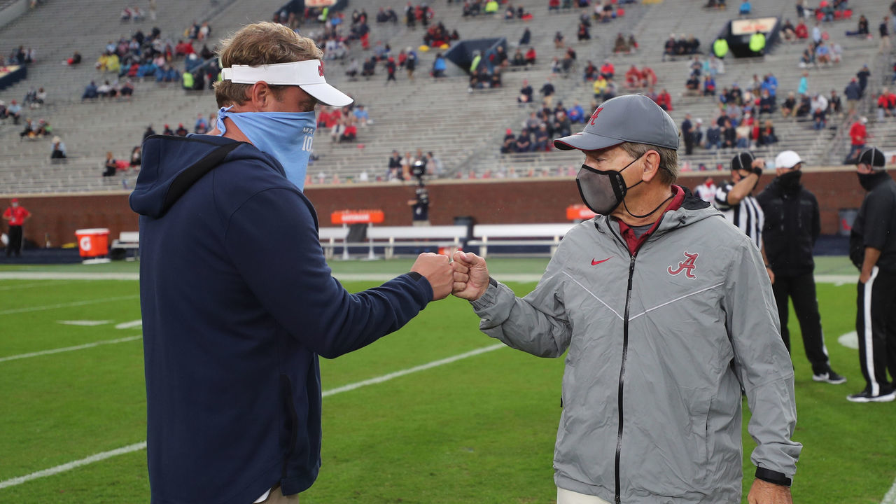 OXFORD, MS - OCTOBER 10: Head coach Nick Saban of the Alabama Crimson Tide meets head coach Lane Kiffin of the Ole Miss Rebels at Vaught Hemingway Stadium on October 10, 2020 in Oxford, Mississippi.