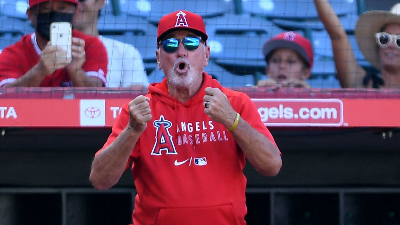 ANAHEIM, CA - SEPTEMBER 19: Manager Joe Maddon #70 of the Los Angeles Angels yells from the dugout as he argues a third strike call in the ninth inning against the Oakland Athletics at Angel Stadium of Anaheim on September 19, 2021 in Anaheim, California.