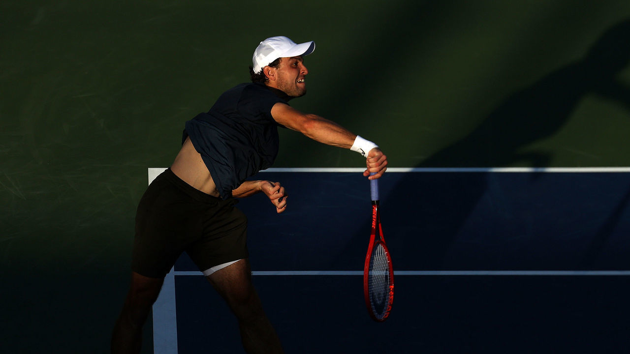 NEW YORK, NEW YORK - SEPTEMBER 04: Aslan Karatsev of Russia serves against Jenson Brooksby of the United States during his Men's Singles third round match of the 2021 US Open at the USTA Billie Jean King National Tennis Center on September 04, 2021 in the Flushing neighborhood of the Queens borough of New York City.