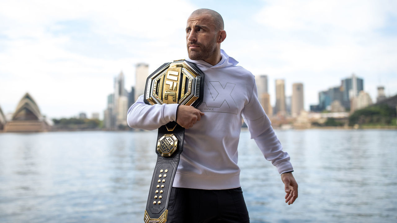 SYDNEY, AUSTRALIA - SEPTEMBER 18: Australian UFC fighter Alex Volkanovski poses during a portrait session at Kirribilli on September 18, 2021 in Sydney, Australia. Alex 'The Great' Volkanovski is the current UFC Featherweight Champion and is fighting Brian Ortega of the United States in the Featherweight division at UFC 266 in Las Vegas on September 26th, 2021.