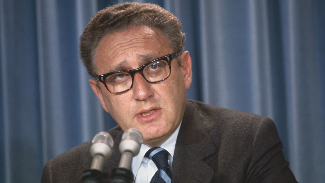 (Original Caption) Henry Kissinger announces to newsmen at the White House 2/22 that the U.S. and China will establish "liaison offices" in each other's capitals - a step which stops just short of full diplomatic relations between the one-time bitter enemies. The announcement came on the first anniversary of President Nixon's arrival in Peking. At Kissinger's left is Ron Ziegler, White House press secretary.