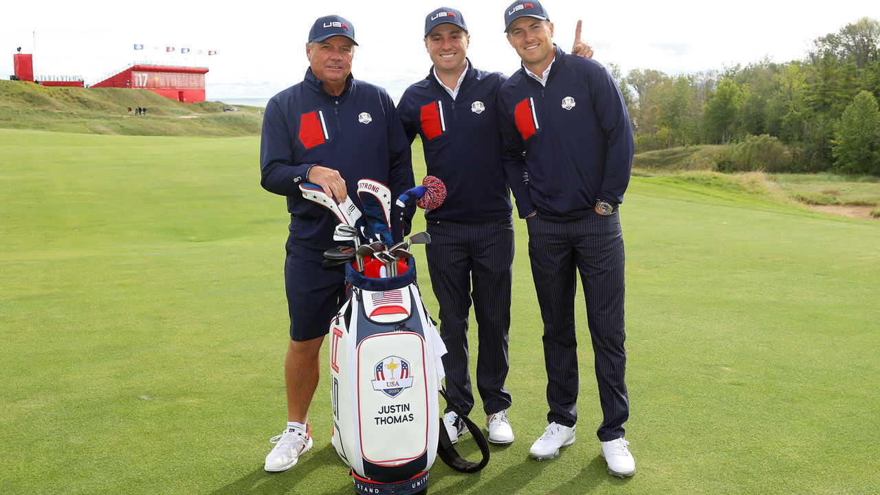 KOHLER, WISCONSIN - SEPTEMBER 22: Justin Thomas of team United States (C) poses for photos with his caddie Jimmy Johnson (L) and Jordan Spieth of team United States during a practice round prior to the 43rd Ryder Cup at Whistling Straits on September 22, 2021 in Kohler, Wisconsin.