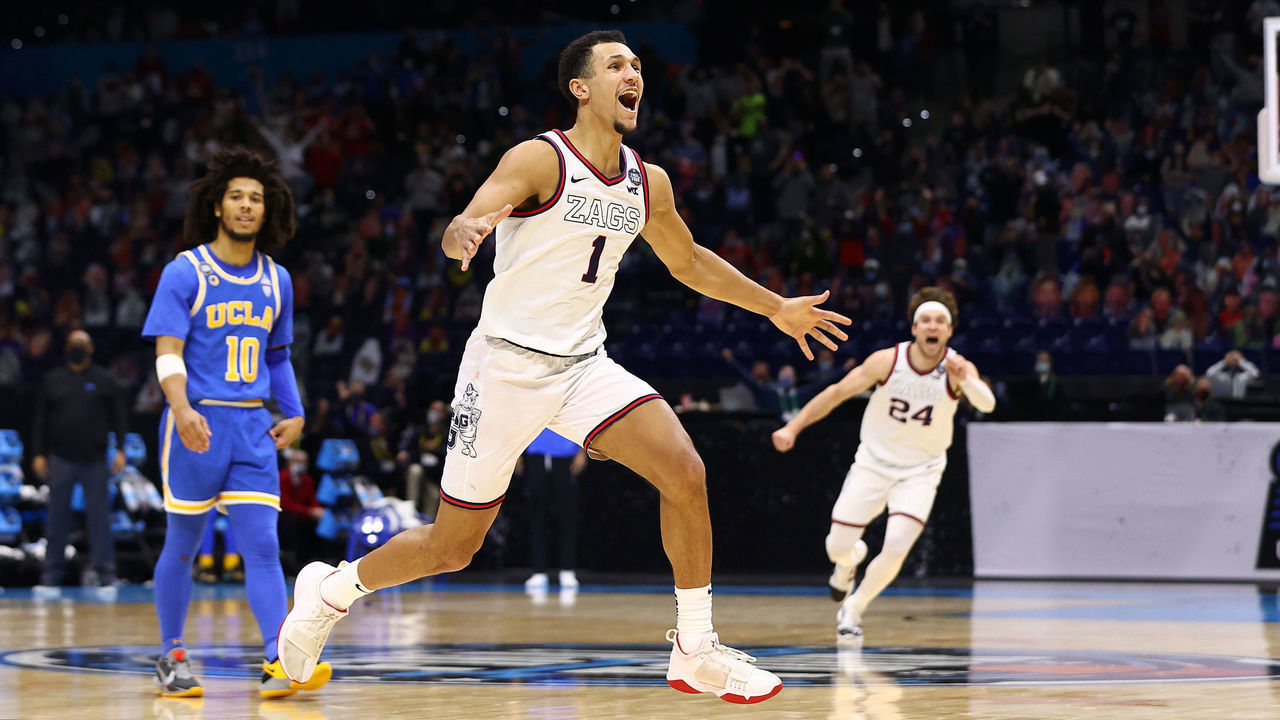 INDIANAPOLIS, INDIANA - APRIL 03: Jalen Suggs #1 of the Gonzaga Bulldogs celebrates after making the game-winning, last-second, three-point shot in overtime against the UCLA Bruins in the Final Four semifinal game of the 2021 NCAA Men's Basketball Tournament at Lucas Oil Stadium on April 03, 2021 in Indianapolis, Indiana.