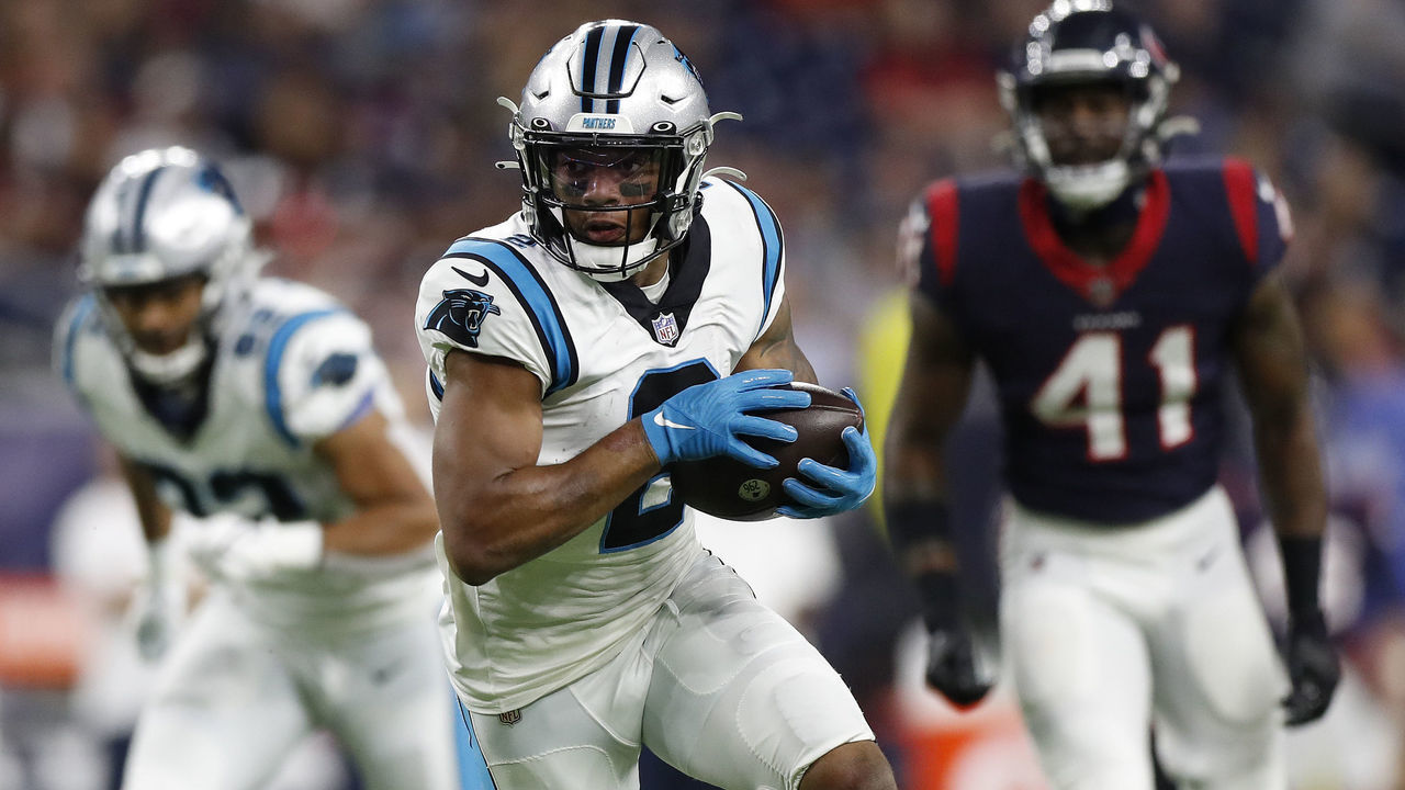 HOUSTON, TEXAS - SEPTEMBER 23: D.J. Moore #2 of the Carolina Panthers looks for yards after a first quarter catch while playing thge Houston Texans at NRG Stadium on September 23, 2021 in Houston, Texas.