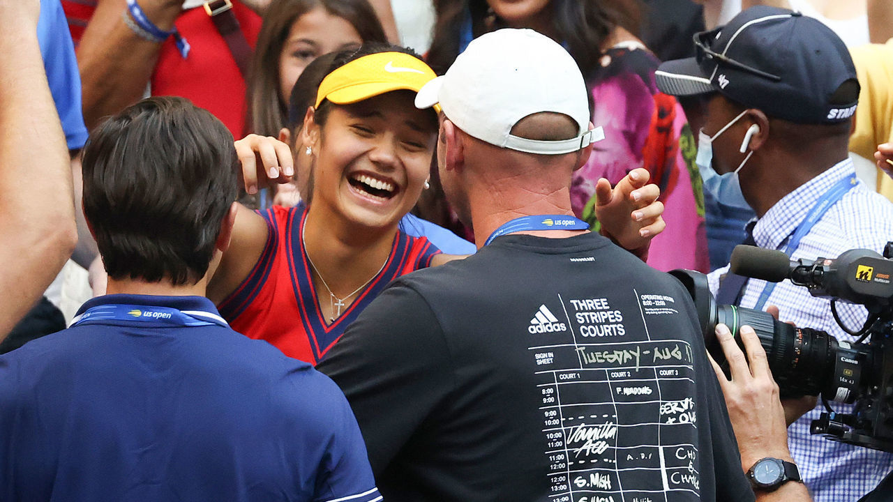 NEW YORK, NEW YORK - SEPTEMBER 11: Emma Raducanu of Great Britain celebrates with her coach Andrew Richardson after defeating Leylah Annie Fernandez of Canada during the second set of their Women's Singles final match on Day Thirteen of the 2021 US Open at the USTA Billie Jean King National Tennis Center on September 11, 2021 in the Flushing neighborhood of the Queens borough of New York City.