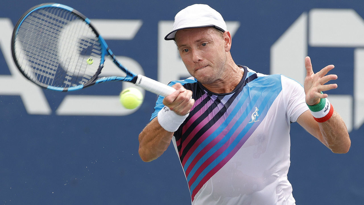 NEW YORK, NEW YORK - AUGUST 30: James Duckworth of Australia returns against Pedro Martinez of Spain during their men's singles first round match on Day One of the 2021 US Open at the Billie Jean King National Tennis Center on August 30, 2021 in the Flushing neighborhood of the Queens borough of New York City.