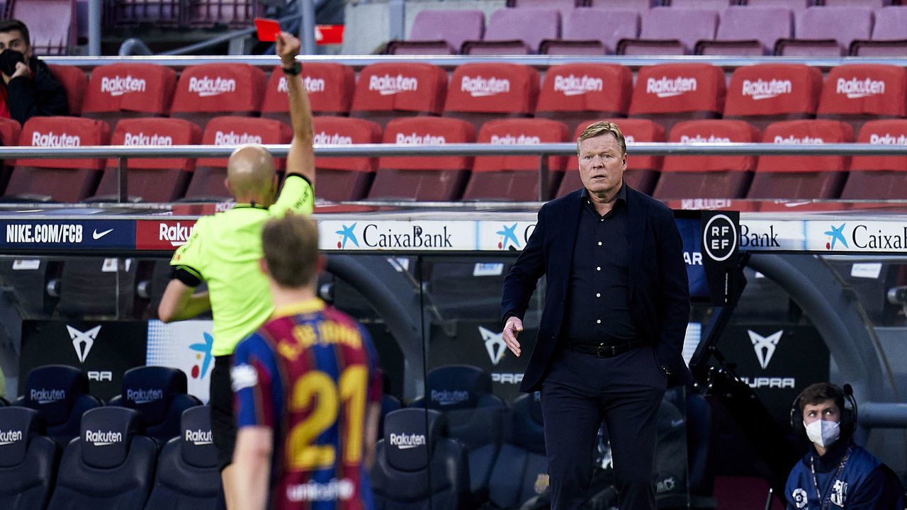 BARCELONA, SPAIN - APRIL 29: Ronald Koeman, head coach of FC Barcelona is seen a red card during the La Liga Santander match between FC Barcelona and Granada CF at Camp Nou on April 29, 2021 in Barcelona, Spain. Sporting stadiums around Spain remain under strict restrictions due to the Coronavirus Pandemic as Government social distancing laws prohibit fans inside venues resulting in games being played behind closed doors.