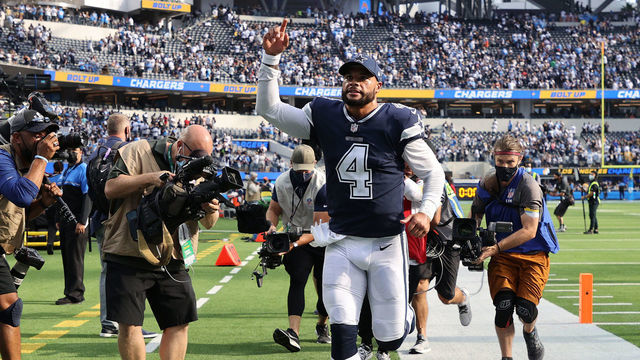 INGLEWOOD, CALIFORNIA - SEPTEMBER 19: Dak Prescott #4 of the Dallas Cowboys reacts as he leaves the filed after a 20-17 win over the Los Angeles Chargers at SoFi Stadium on September 19, 2021 in Inglewood, California.