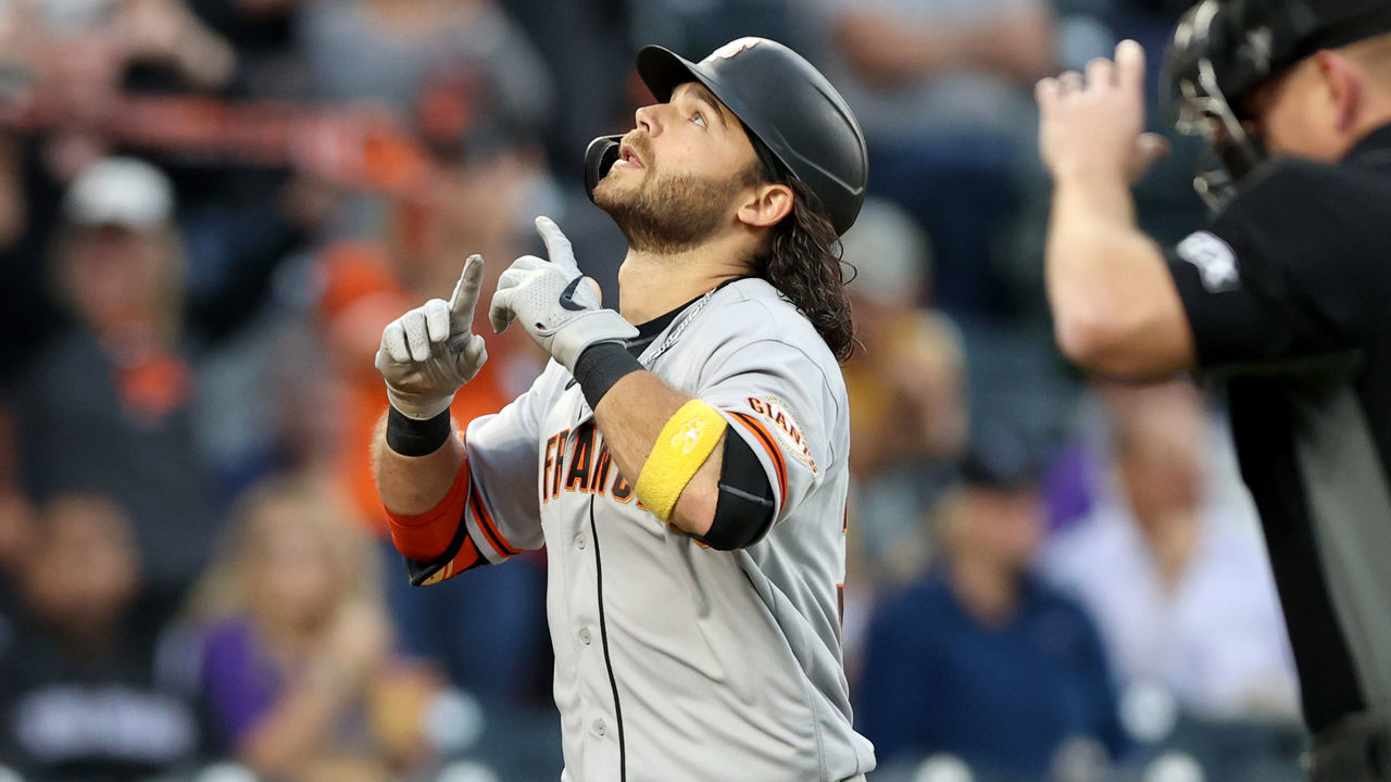 DENVER, COLORADO - SEPTEMBER 24: Brandon Crawford #35 of the San Francisco Giants gestures as he circles the bases after hitting a solo home run against the Colorado Rockies in the second inning at Coors Field on September 24, 2021 in Denver, Colorado.