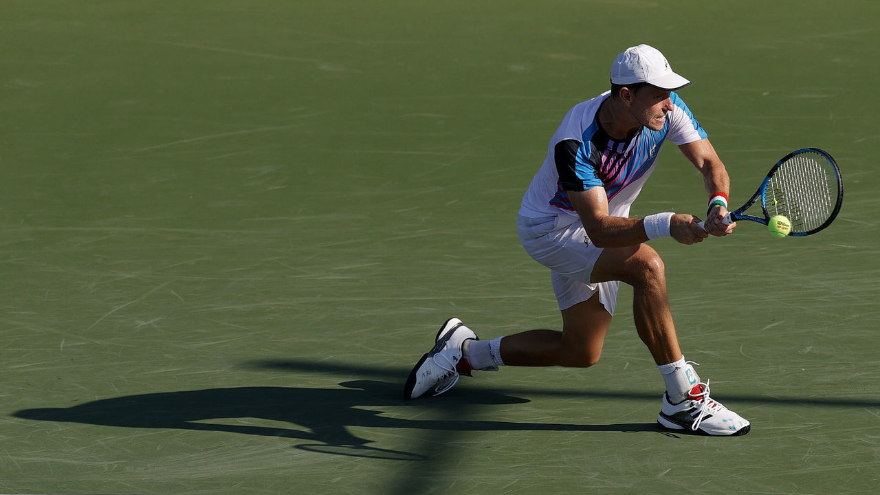NEW YORK, NEW YORK - AUGUST 30: James Duckworth of Australia returns against Pedro Martinez of Spain during their men's singles first round match on Day One of the 2021 US Open at the Billie Jean King National Tennis Center on August 30, 2021 in the Flushing neighborhood of the Queens borough of New York City.