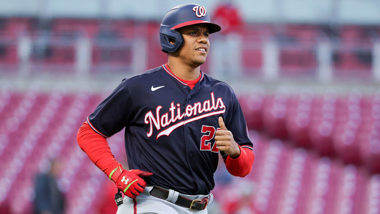 CINCINNATI, OHIO - SEPTEMBER 23: Juan Soto #22 of the Washington Nationals jogs to first base after drawing a walk in the first inning against the Cincinnati Reds at Great American Ball Park on September 23, 2021 in Cincinnati, Ohio. The walk set the franchise record for most walks by a player in a single season.
