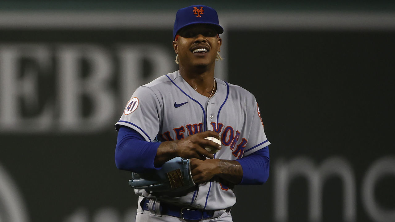 BOSTON, MA - SEPTEMBER 21: Marcus Stroman #0 of the New York Mets smiles against the Boston Red Sox during the first inning at Fenway Park on September 21, 2021 in Boston, Massachusetts.