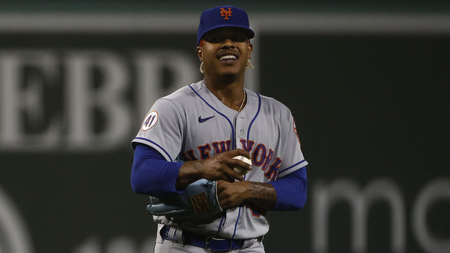 BOSTON, MA - SEPTEMBER 21: Marcus Stroman #0 of the New York Mets smiles against the Boston Red Sox during the first inning at Fenway Park on September 21, 2021 in Boston, Massachusetts.
