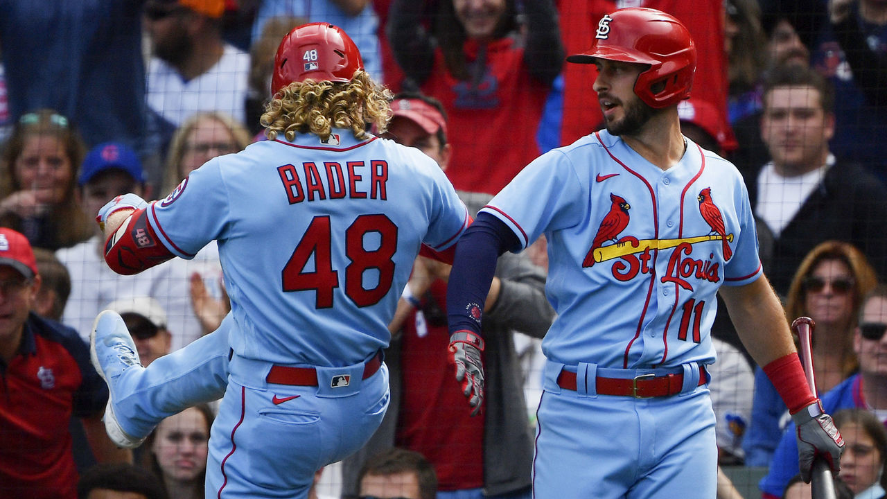 CHICAGO, ILLINOIS - SEPTEMBER 25: Harrison Bader #48 and Paul DeJong #11 of the St. Louis Cardinals celebrate after a solo home run in the second inning against the Chicago Cubs at Wrigley Field on September 25, 2021 in Chicago, Illinois.