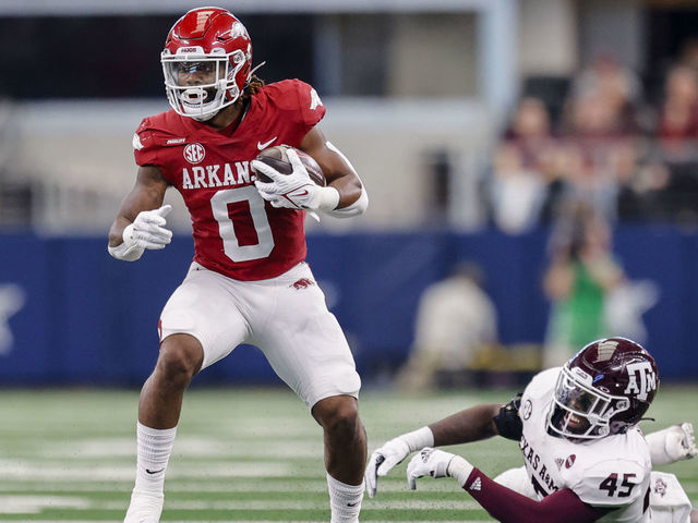 ARLINGTON, TX - SEPTEMBER 25: Arkansas Razorbacks running back AJ Green (0) runs for a first down during the Southwest Classic game between the Texas A&M Aggies and the Arkansas Razorbacks on September 25, 2021 at AT&T Stadium in Arlington, Texas.