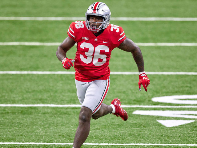 INDIANAPOLIS, IN - DECEMBER 19: Ohio State Buckeyes linebacker K'Vaughan Pope (36) runs in action during the Big Ten Championship game between the Ohio State Buckeyes and the Northwestern Wildcats on December 19, 2020 at Lucas Oil stadium, in Indianapolis, IN.