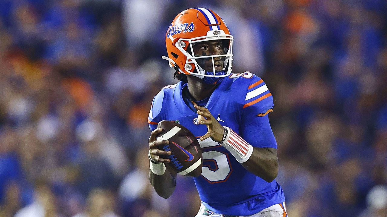 GAINESVILLE, FLORIDA - SEPTEMBER 25: Emory Jones #5 of the Florida Gators looks to pass against Byron Young #6 of the Tennessee Volunteers during the second quarter of a game at Ben Hill Griffin Stadium on September 25, 2021 in Gainesville, Florida.