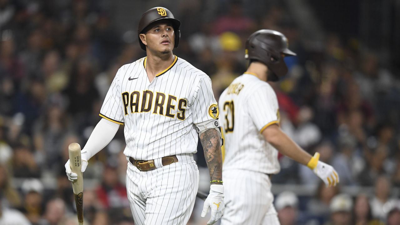 SAN DIEGO, CA - SEPTEMBER 25: Manny Machado #13 of the San Diego Padres walks back to the dugout after striking out during the ninth inning of a baseball game against the Atlanta Braves at Petco Park on September 25, 2021 in San Diego, California.