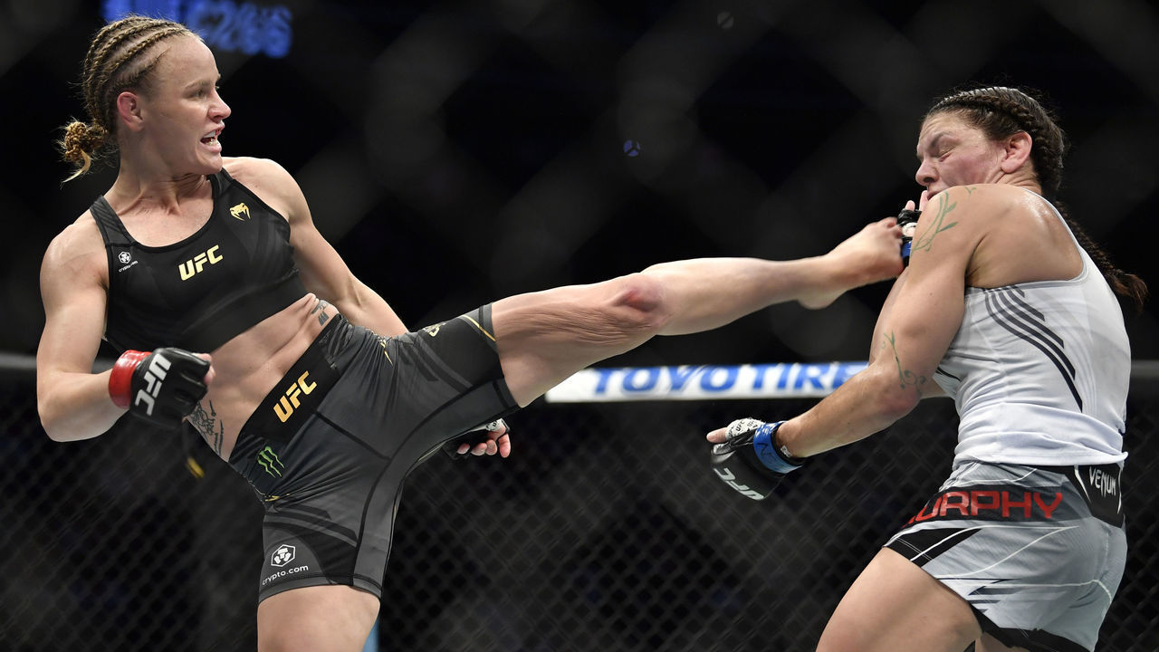 LAS VEGAS, NEVADA - SEPTEMBER 25: (L-R) Valentina Shevchenko of Kyrgyzstan kicks Lauren Murphy in their UFC flyweight championship fight during the UFC 266 event on September 25, 2021 in Las Vegas, Nevada.