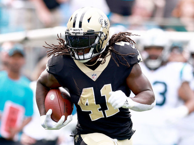 CHARLOTTE, NORTH CAROLINA - SEPTEMBER 19: Alvin Kamara #41 of the New Orleans Saints runs against the Carolina Panthers at Bank of America Stadium on September 19, 2021 in Charlotte, North Carolina.