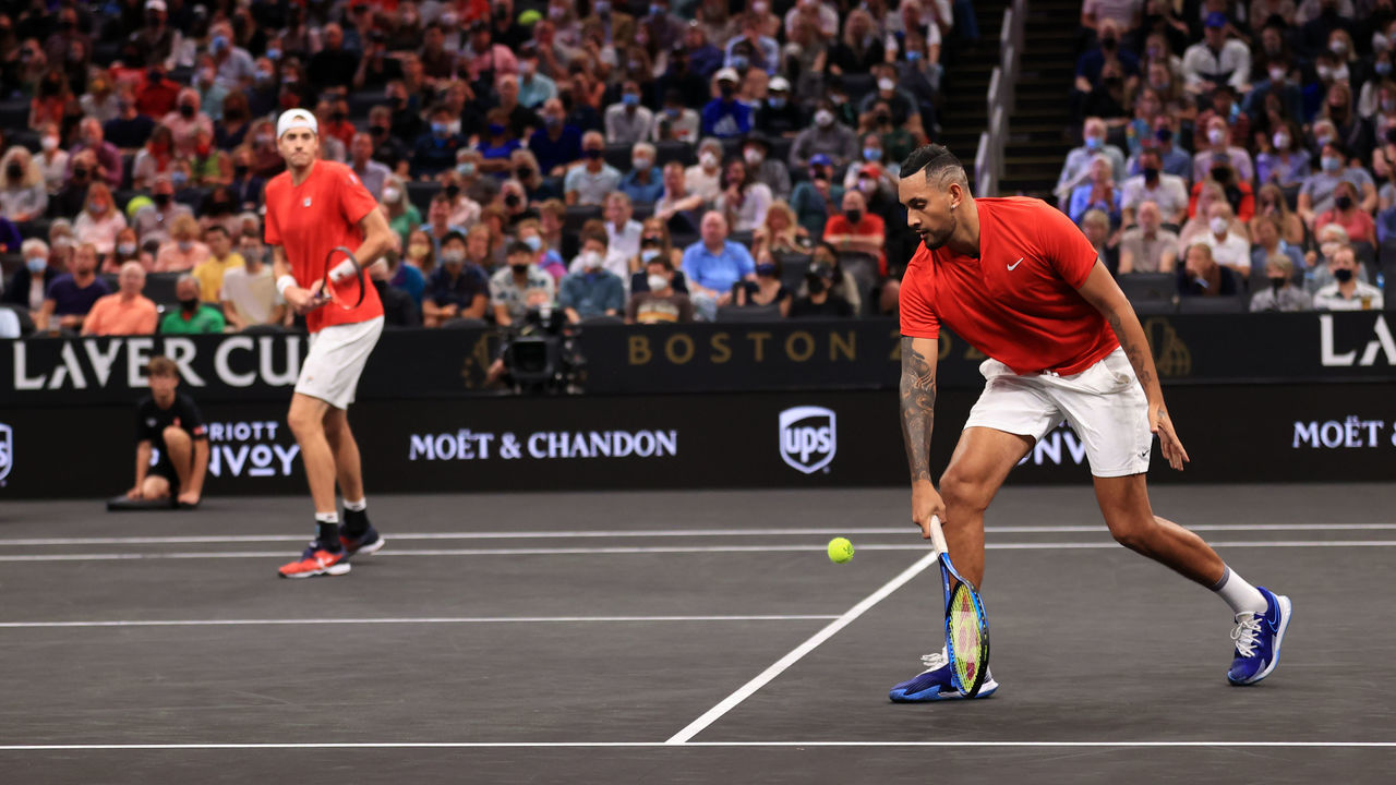 BOSTON, MASSACHUSETTS - SEPTEMBER 25: John Isner and Nick Kyrgios of Team World play a shot against Andrey Rublev and Stefanos Tsitsipas of Team Europe during the eighth match during Day 2 of the 2021 Laver Cup at TD Garden on September 25, 2021 in Boston, Massachusetts.