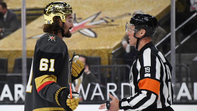 LAS VEGAS, NEVADA - MARCH 29: Mark Stone #61 of the Vegas Golden Knights talks to referee Gord Dwyer in the second period of the Golden Knights' game against the Los Angeles Kings at T-Mobile Arena on March 29, 2021 in Las Vegas, Nevada. The Golden Knights defeated the Kings 4-1.