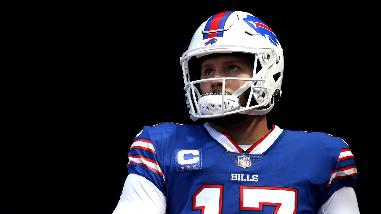 ORCHARD PARK, NEW YORK - SEPTEMBER 26: Quarterback Josh Allen #17 of the Buffalo Bills walks out of the tunnel for the third quarter of the game against the Washington Football Team at Highmark Stadium on September 26, 2021 in Orchard Park, New York.