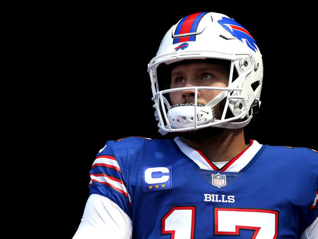 Josh Allen throws for a TD, runs for another as Bills rout Commanders