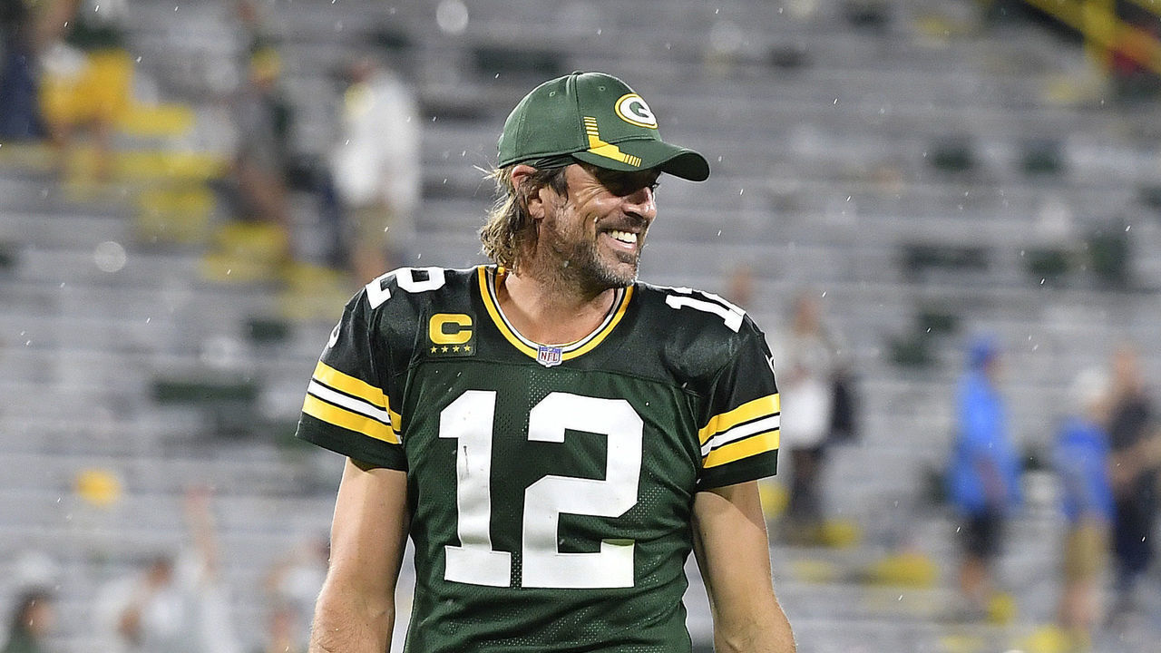 GREEN BAY, WISCONSIN - SEPTEMBER 20: Aaron Rodgers #12 of the Green Bay Packers reacts as he walks of the field following the team's win against the Detroit Lions during an NFL football game at Lambeau Field on September 20, 2021 in Green Bay, Wisconsin.