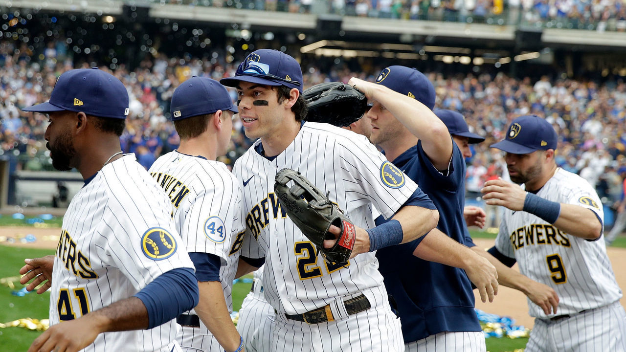 MILWAUKEE, WISCONSIN - SEPTEMBER 26: Christian Yelich #22 of the Milwaukee Brewers celebrates after winning the division at American Family Field on September 26, 2021 in Milwaukee, Wisconsin.