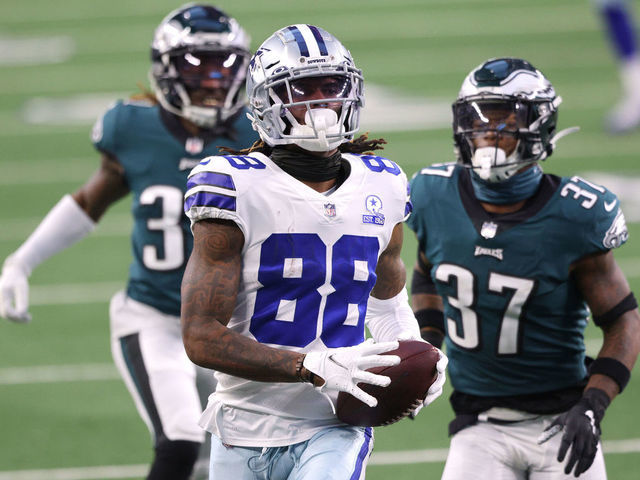 ARLINGTON, TEXAS - DECEMBER 27: CeeDee Lamb #88 of the Dallas Cowboys scores a touchdown in the third quarter against the Philadelphia Eagles at AT&T Stadium on December 27, 2020 in Arlington, Texas.