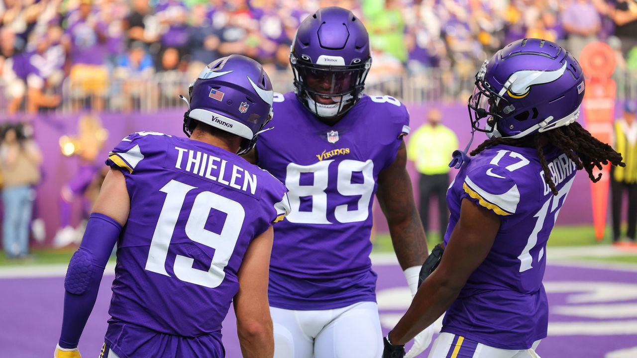 MINNEAPOLIS, MINNESOTA - SEPTEMBER 26: Adam Thielen #19 of the Minnesota Vikings celebrates his second quarter touchdown with Chris Herndon #89 and K.J. Osborn #17 in the game against the Seattle Seahawks at U.S. Bank Stadium on September 26, 2021 in Minneapolis, Minnesota.
