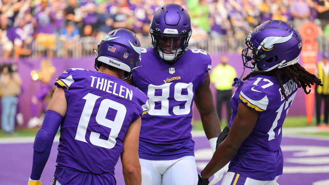 MINNEAPOLIS, MINNESOTA - SEPTEMBER 26: Adam Thielen #19 of the Minnesota Vikings celebrates his second quarter touchdown with Chris Herndon #89 and K.J. Osborn #17 in the game against the Seattle Seahawks at U.S. Bank Stadium on September 26, 2021 in Minneapolis, Minnesota.