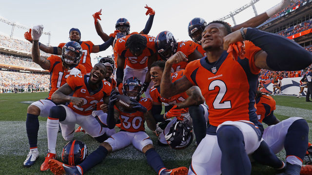 DENVER, COLORADO - SEPTEMBER 26: Caden Sterns #30 of the Denver Broncos celebrates his interception with teammates against the New York Jets in the fourth quarter of the game at Empower Field At Mile High on September 26, 2021 in Denver, Colorado.