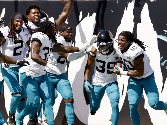 JACKSONVILLE, FLORIDA - SEPTEMBER 26: Jamal Agnew #39 of the Jacksonville Jaguars celebrates with teammates after returning a missed FG for a touchdown during the first half in the game against the Arizona Cardinals at TIAA Bank Field on September 26, 2021 in Jacksonville, Florida.