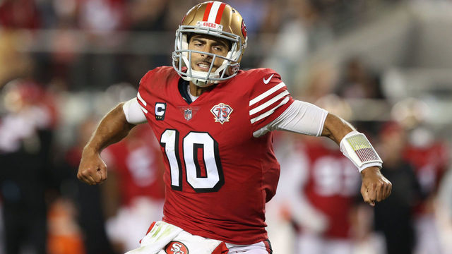 SANTA CLARA, CALIFORNIA - SEPTEMBER 26: Jimmy Garoppolo #10 of the San Francisco 49ers celebrates after a touchdown during the second half against the Green Bay Packers in the game at Levi's Stadium on September 26, 2021 in Santa Clara, California.