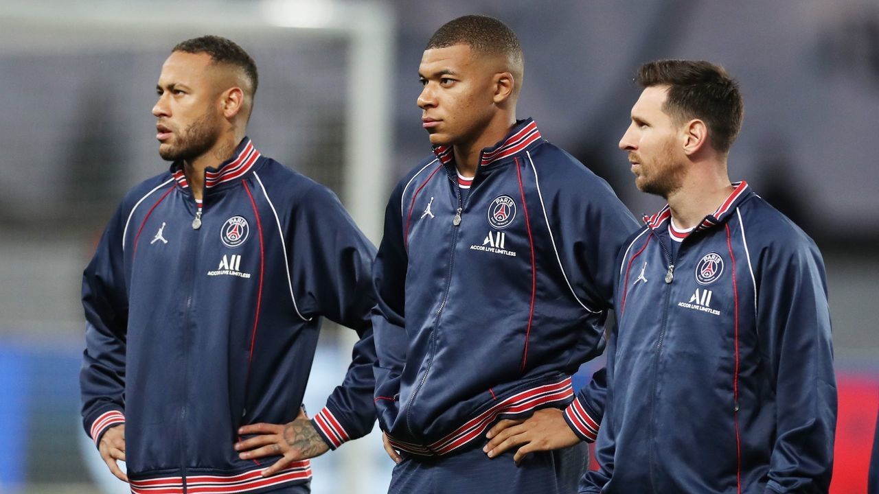 Paris Saint Germain's Lionel Messi R, NeymarL and Kylian Mbappe reacts before a French Ligue 1 football match between Paris Saint Germain PSG and Lyon in Paris, France, Sept. 19, 2021.
