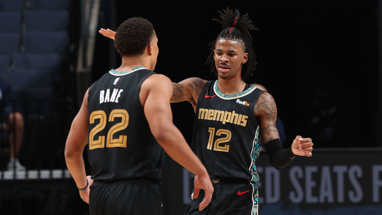 MEMPHIS, TN - FEBRUARY 26: Ja Morant #12 hi-fives Desmond Bane #22 of the Memphis Grizzlies during the game against the LA Clippers on February 26, 2021 at FedExForum in Memphis, Tennessee. Mandatory Copyright Notice: Copyright 2021 NBAE