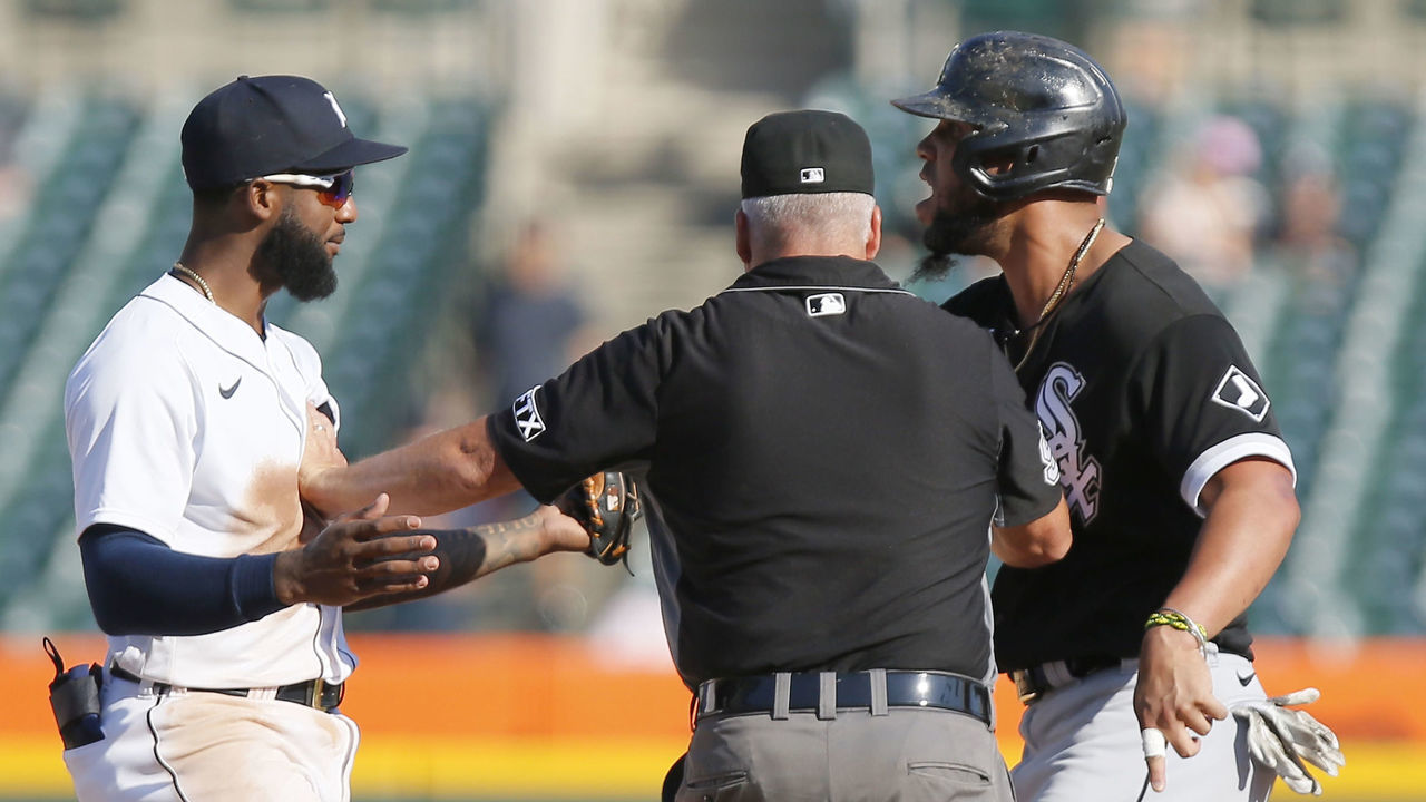 DETROIT, MI - SEPTEMBER 27: Jose Abreu #79 of the Chicago White Sox and shortstop Niko Goodrum #28 of the Detroit Tigers are kept apart by umpire Tim Timmons after Abreau was tagged out attempting to steal second base during the ninth inning at Comerica Park on September 27, 2021, in Detroit, Michigan.