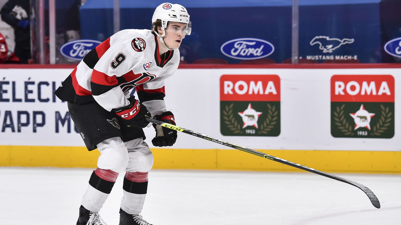 MONTREAL, QC - FEBRUARY 19: Ridly Greig #9 of the Belleville Senators skates against the Laval Rocket during the first period at the Bell Centre on February 19, 2021 in Montreal, Canada. The Laval Rocket defeated the Belleville Senators 5-2.