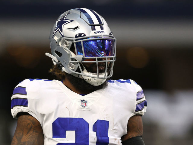 Ezekiel Elliott of the Dallas Cowboys warms up on the field prior to