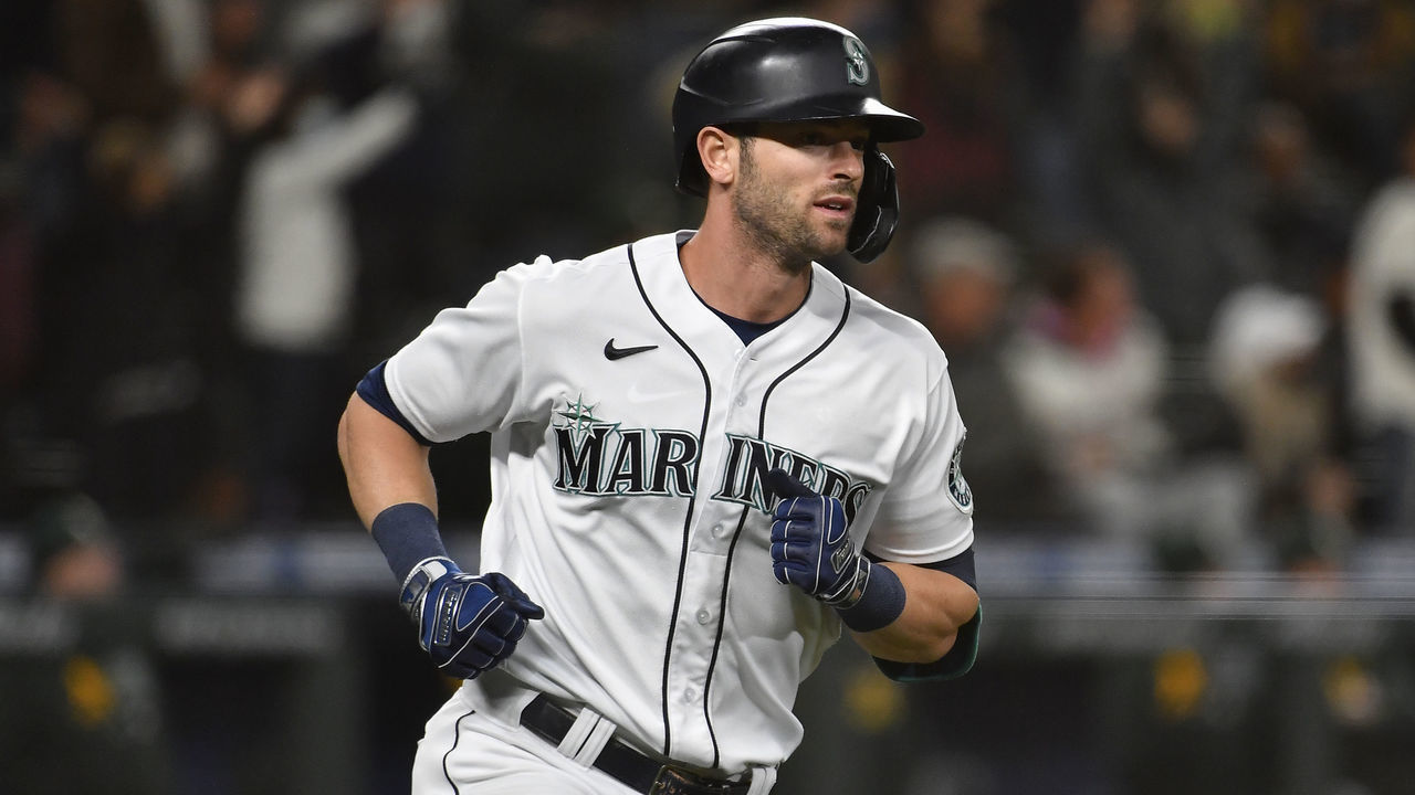 SEATTLE, WASHINGTON - SEPTEMBER 27: Mitch Haniger #17 of the Seattle Mariners rounds the bases on his three-run home run in the sixth inning against the Oakland Athletics at T-Mobile Park on September 27, 2021 in Seattle, Washington.