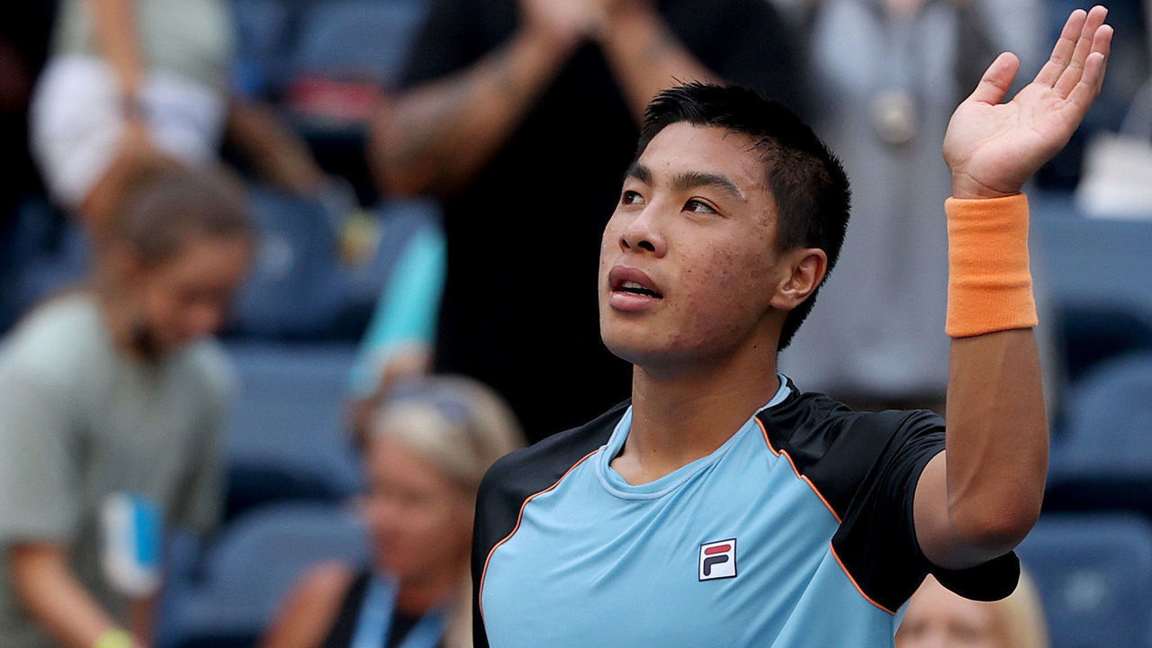 NEW YORK, NEW YORK - AUGUST 30: Brandon Nakashima of the United States celebrates after match point against John Isner of the United States during their men's singles first round match on Day One of the 2021 US Open at the Billie Jean King National Tennis Center on August 30, 2021 in the Flushing neighborhood of the Queens borough of New York City.