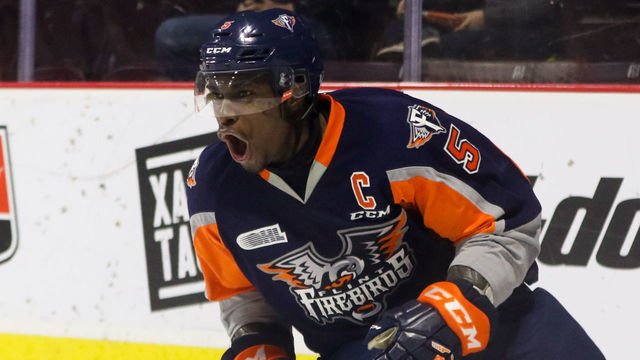 WINDSOR, ON - DECEMBER 03: Defenseman Jalen Smereck #5 of the Flint Firebirds celebrates his game winning overtime goal against the Windsor Spitfires on December 3, 2017 at the WFCU Centre in Windsor, Ontario, Canada.
