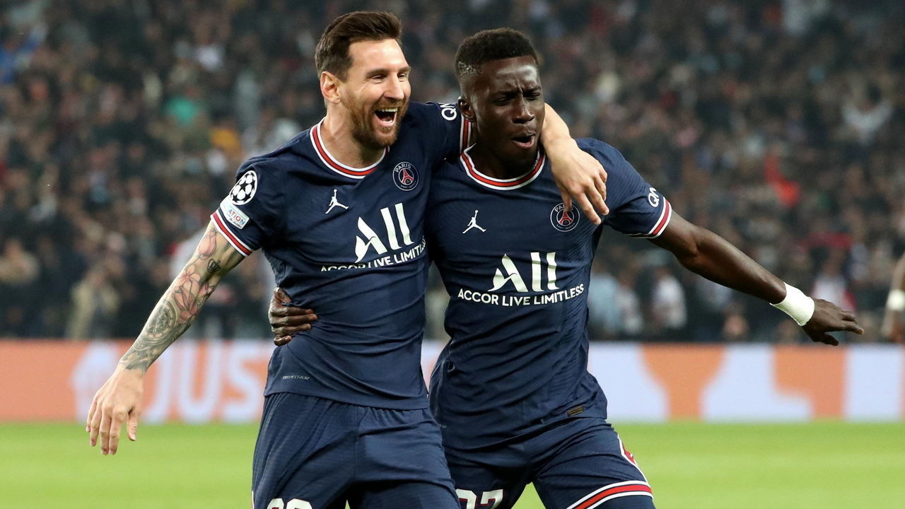 PARIS, FRANCE - SEPTEMBER 28: Idrissa Gueye of Paris Saint-Germain celebrates his goal with Lionel Messi and Nuno Mendes during the UEFA Champions League group A match between Paris Saint-Germain and Manchester City at Parc des Princes on September 28, 2021 in Paris, France.