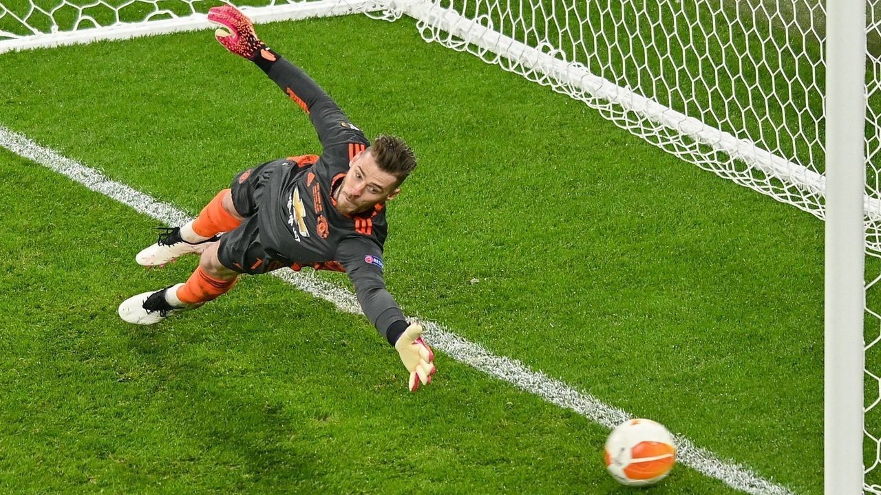David De Gea of Manchester United tires to make a save during penalty shootout during the UEFA Europa League final match between Villarreal CF and Manchester United in Gdansk, Poland, May 26, 2021.