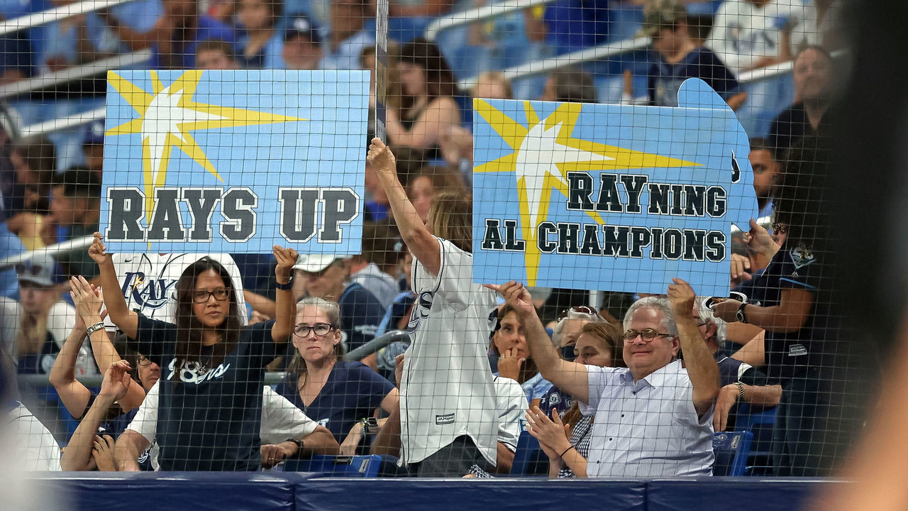 ST. PETERSBURG, FL - SEPTEMBER 24: Fans hold up signs supporting the Tampa Bay Rays in the sixth inning of a baseball game against the Miami Marlins at Tropicana Field on September 24, 2021 in St. Petersburg, Florida.