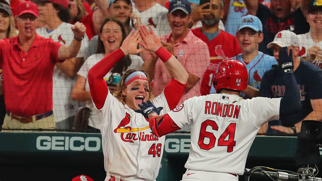 ST LOUIS, MO - SEPTEMBER 28: Harrison Bader #48 of the St. Louis Cardinals congratulates Jose Rondon #64 on his home run against the Milwaukee Brewers in the sixth inning at Busch Stadium on September 28, 2021 in St Louis, Missouri.